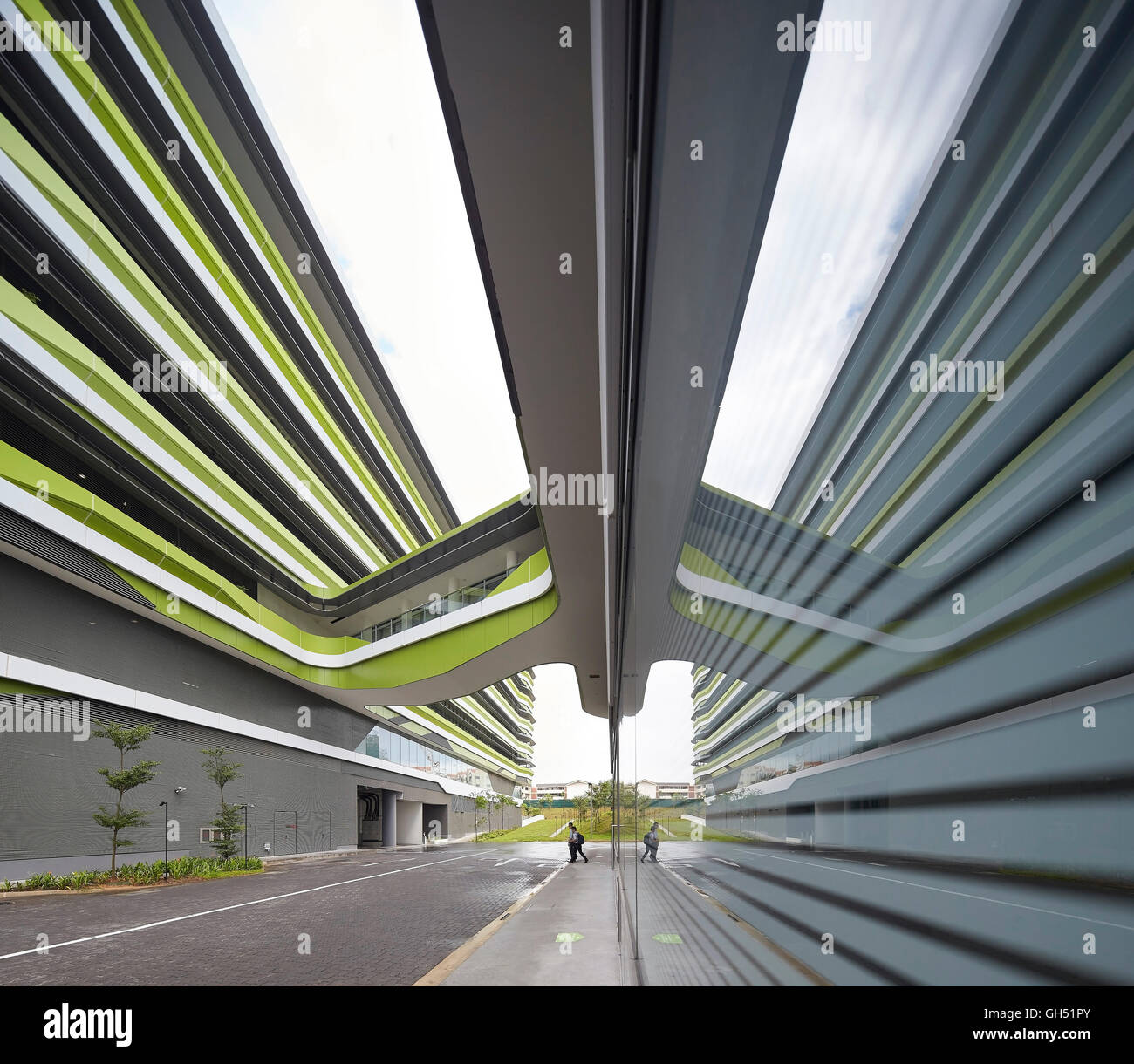 Perspective along glazing in loading area. Singapore University of Technology and Design, Singapore, Singapore. Architect: UNStudio, 2015. Stock Photo
