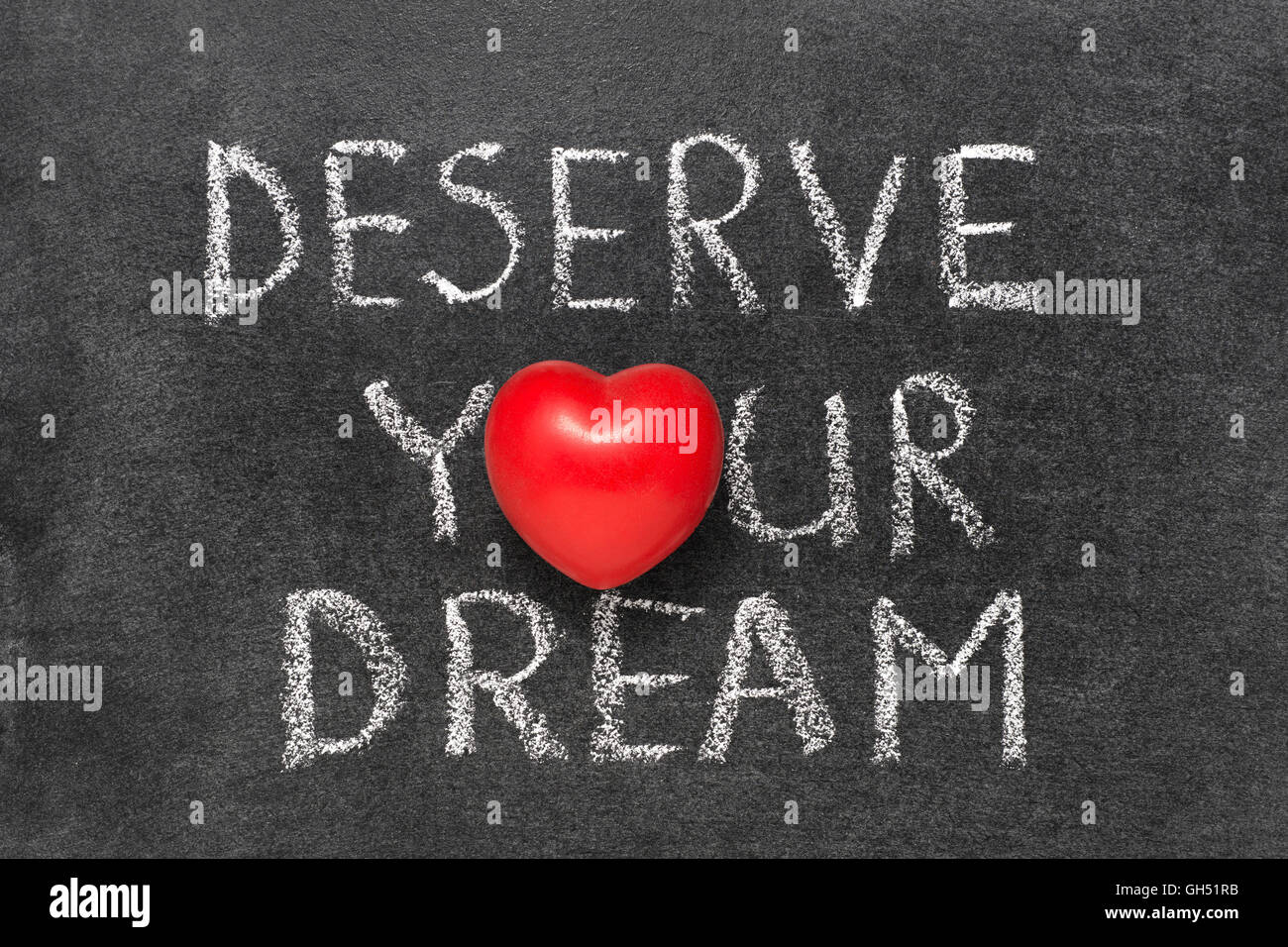 deserve your dream phrase handwritten on blackboard with heart symbol ...