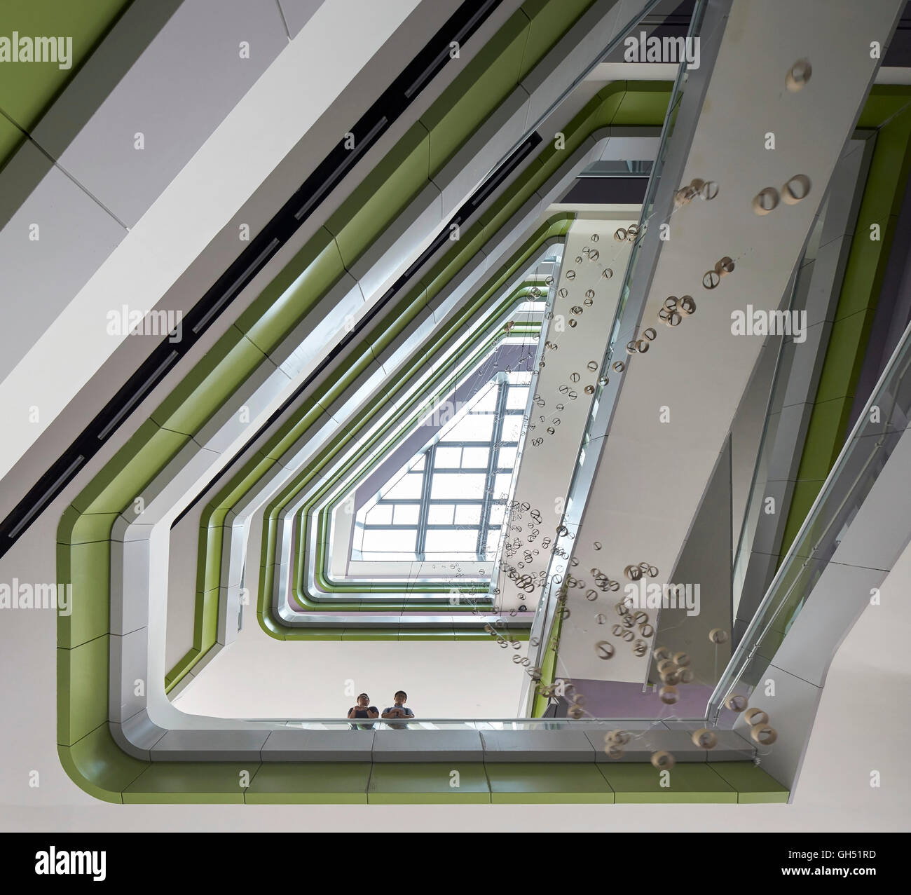 View upwards towards, galleries, staircases and skylight. Singapore University of Technology and Design, Singapore, Singapore. Architect: UNStudio, 2015. Stock Photo