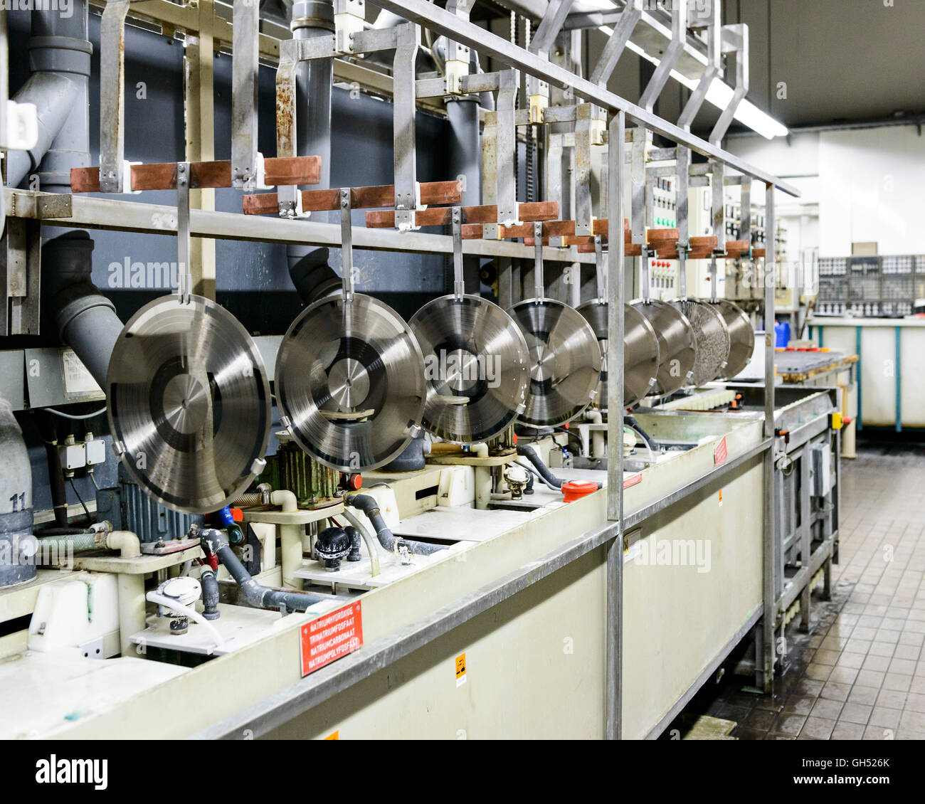 Making a negative of the master. Record Industry Vinyl Factory, Haarlem, Netherlands. Architect