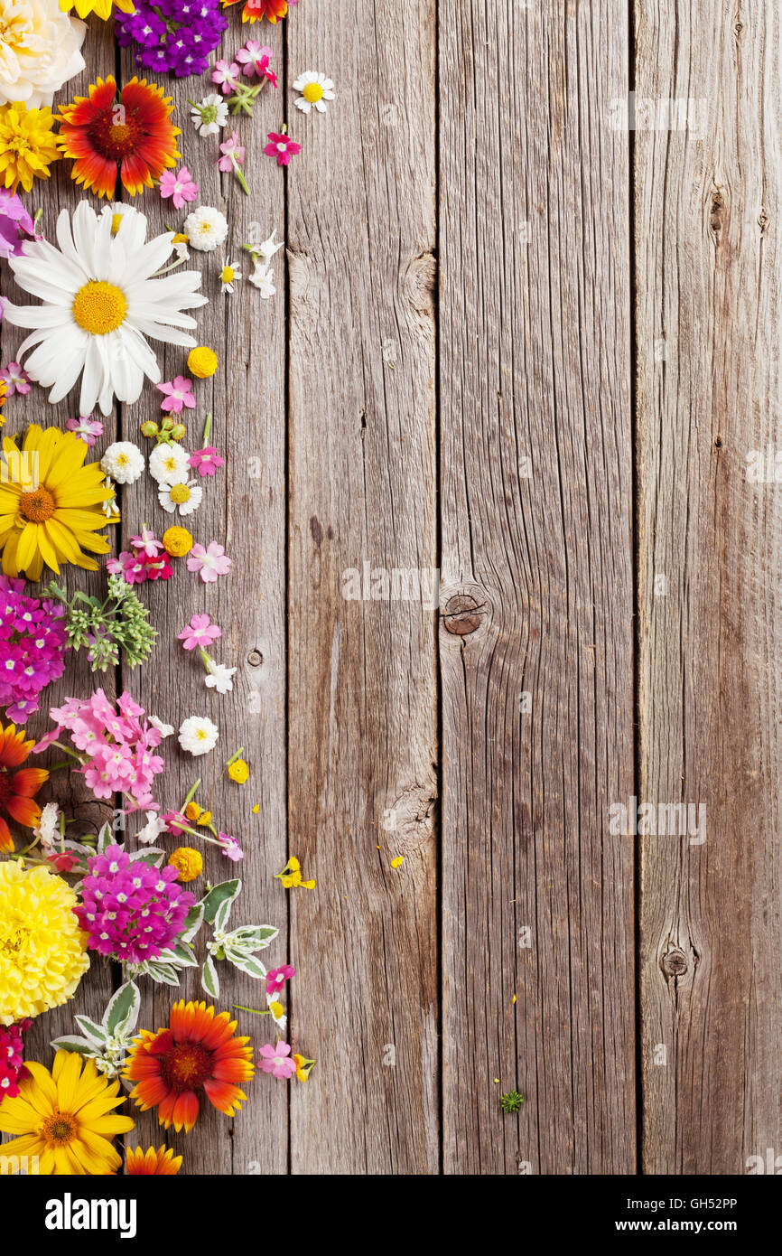 Garden flowers over wooden table background. Backdrop with copy space Stock  Photo - Alamy