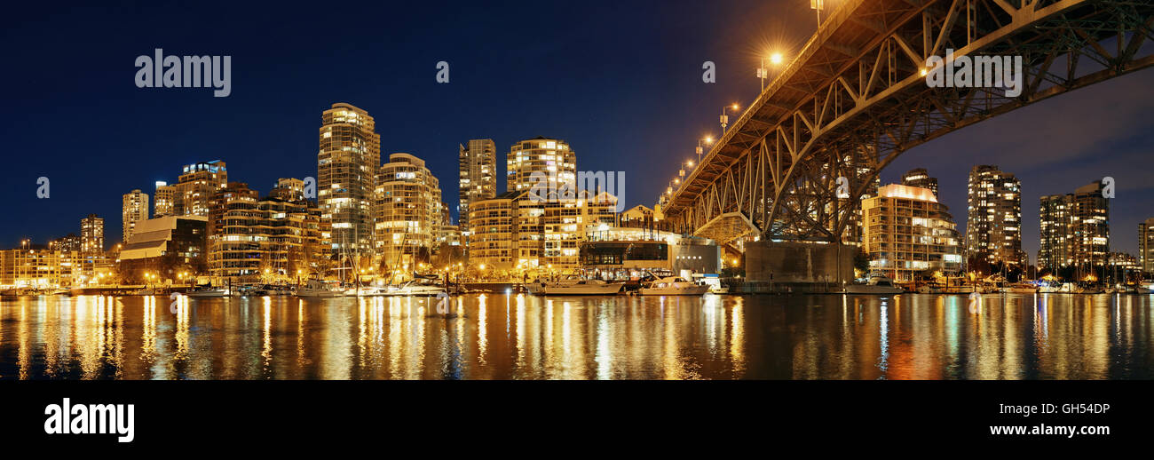 Vancouver False Creek at night with bridge and boat panorama Stock ...