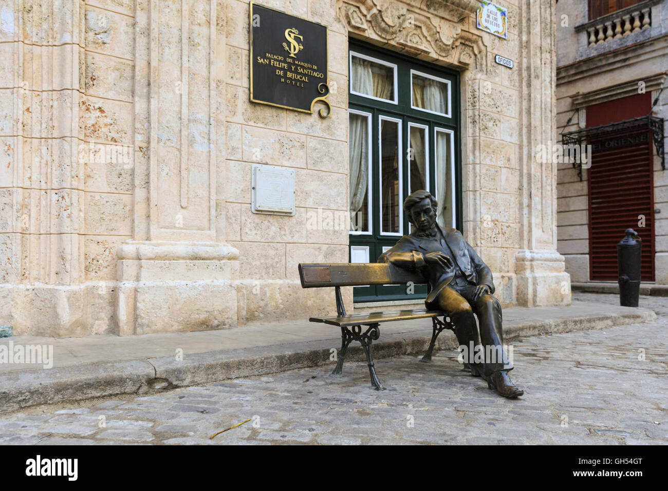 Bronze statue of Frederic Chopin son bench at Hotel Palacio del Marques de San Felipe, Plaza San Francsico de Asis, Havana, Cuba Stock Photo