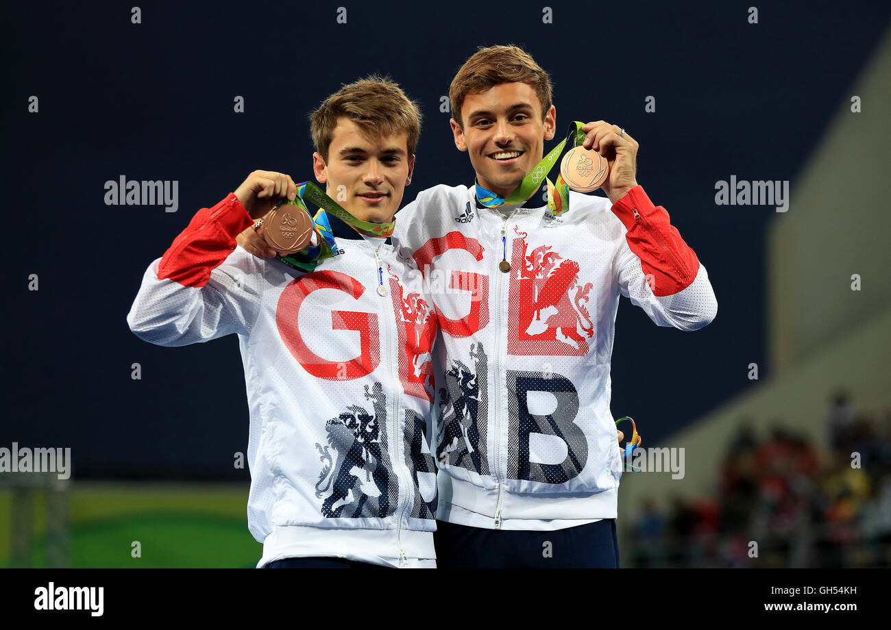 Great Britain's Tom Daley (right) and Daniel Goodfellow (left) celebrate with their bronze medals after the Men's Synchronised 10m Platform Final at the Maria Lenk Aquatics Centre on the third day of the Rio Olympic Games, Brazil. Stock Photo