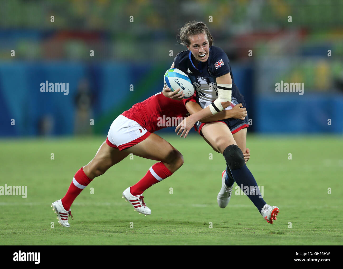 Great Britain's Emily Scarratt is tackled during the rugby sevens bronze medal match at the Deodoro Stadium on the third day of the Rio Olympic Games, Brazil. Stock Photo