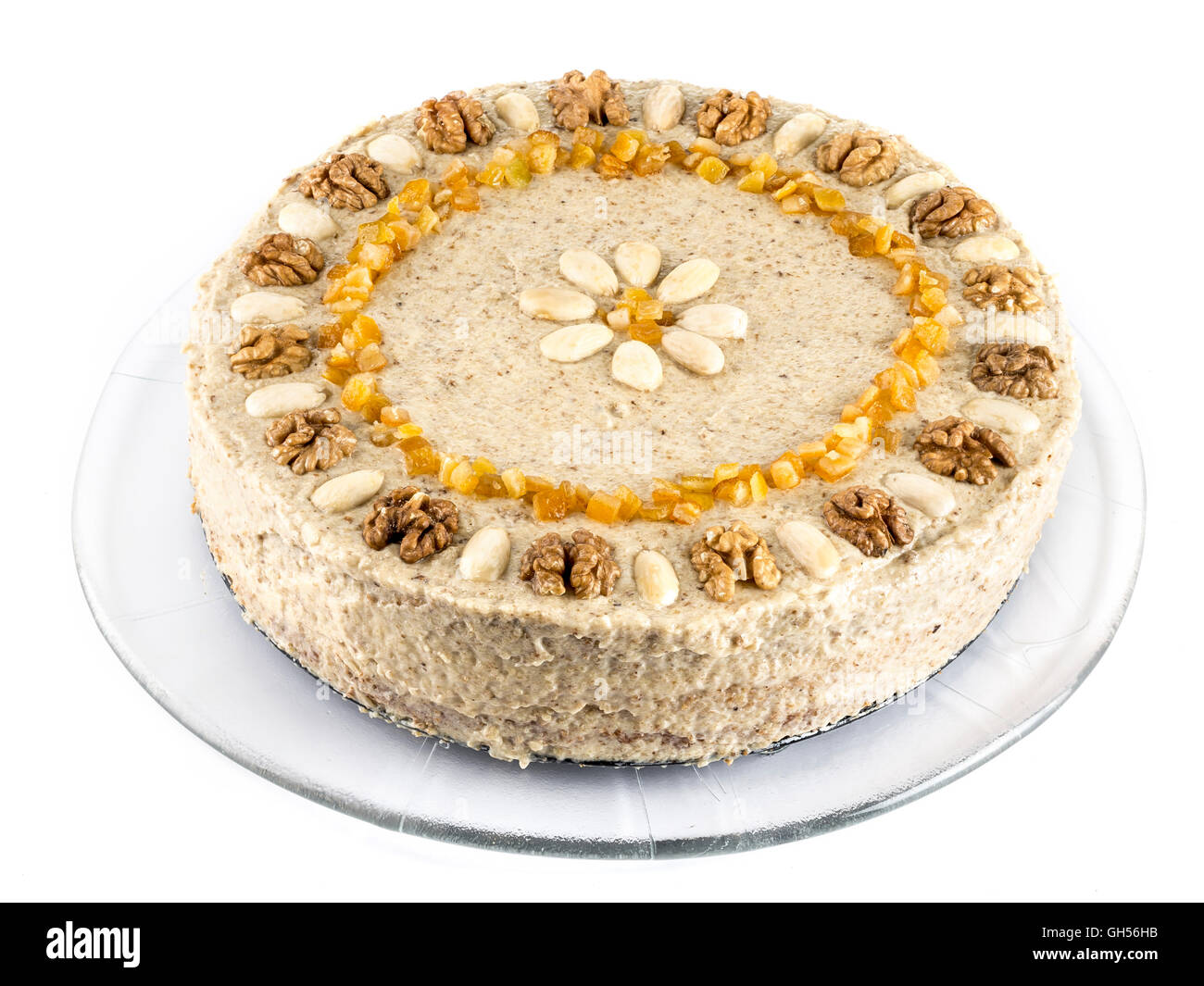 Layer birthday cake with walnut icing shot on white Stock Photo