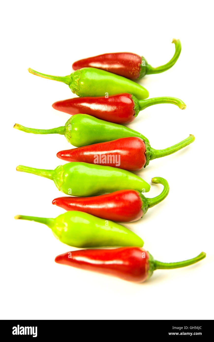 Many ripe red and green Chilli peppers on over white Stock Photo - Alamy