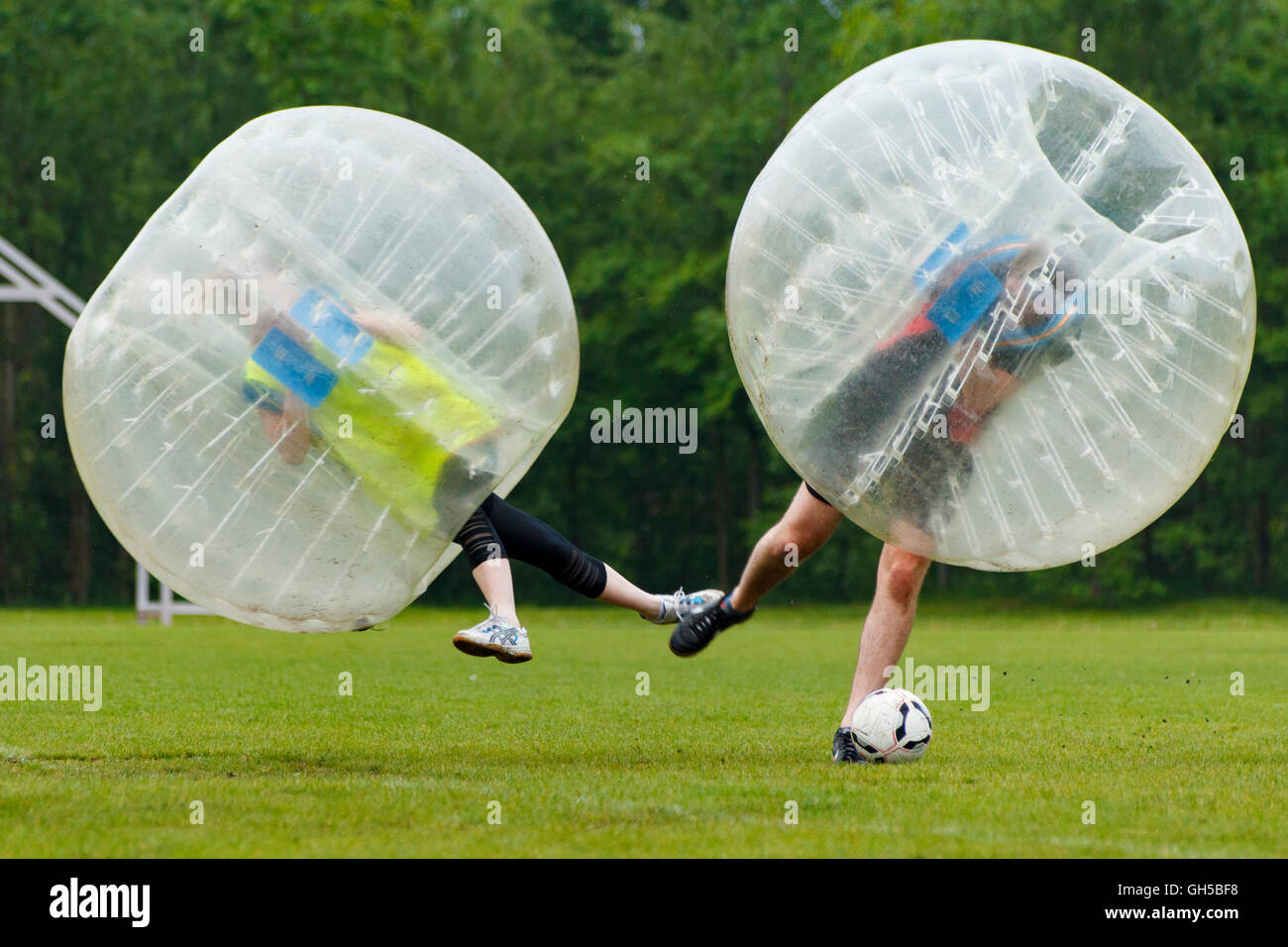 Bubble football funny moment. Concept: Fun, Sport, Flying. Stock Photo