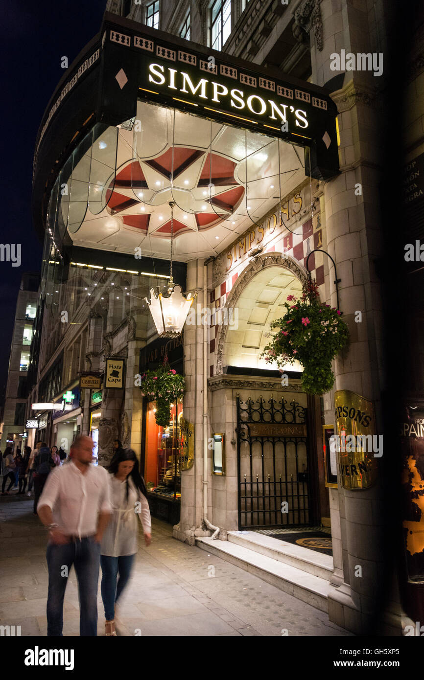 A night time view of the entrance to Simpson's in the Strand, Savoy Building, London, WC2, England, U.K. Stock Photo