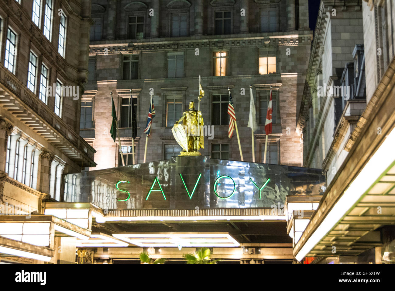 The entrance to the Savoy Hotel in Savoy Court on the Strand in London England Stock Photo