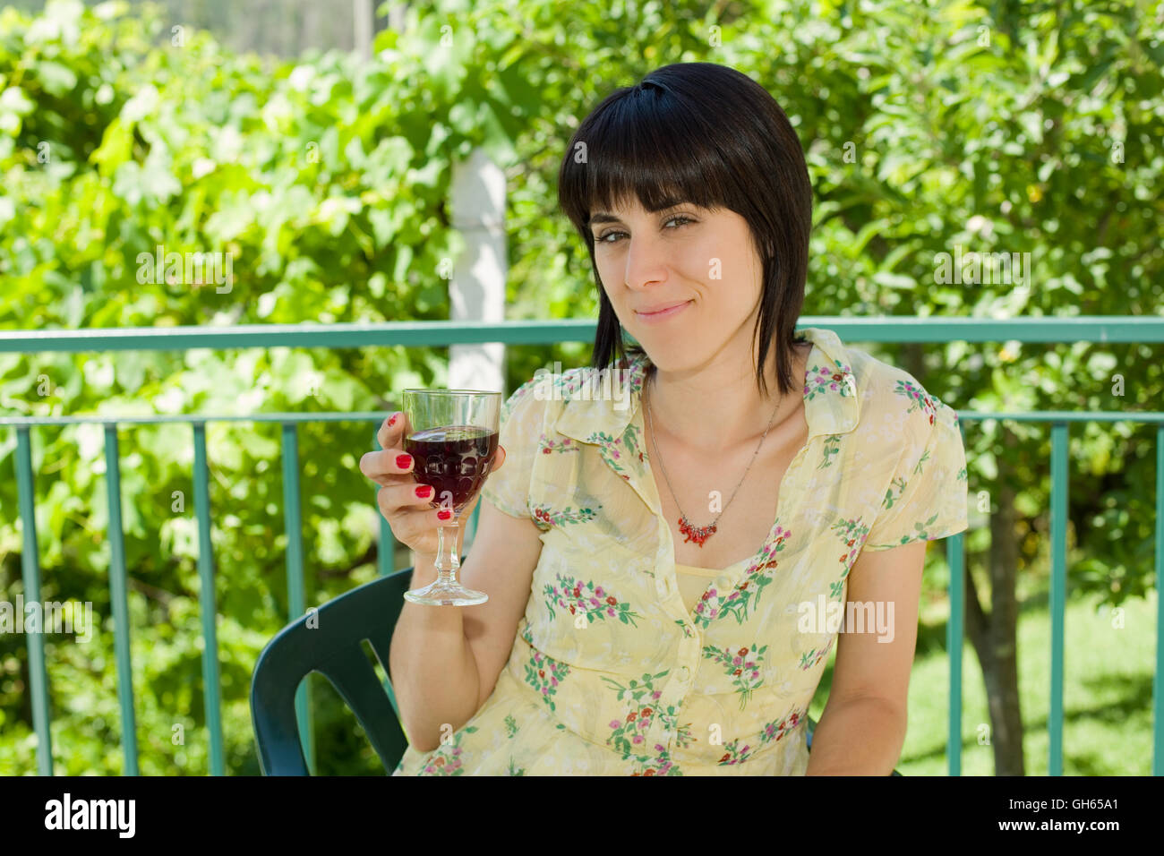 woman drinking red wine in a vineyard, outdoor Stock Photo Alamy