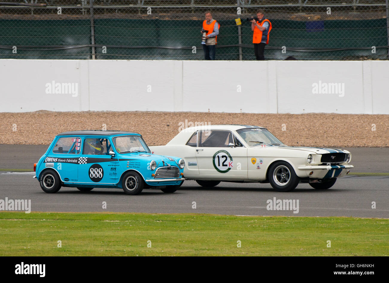 Gregory Thornton, Ford Mustang and Daniel Wheeler, Austin Mini Cooper S, 2016 Silverstone Classic meeting, England, UK Stock Photo