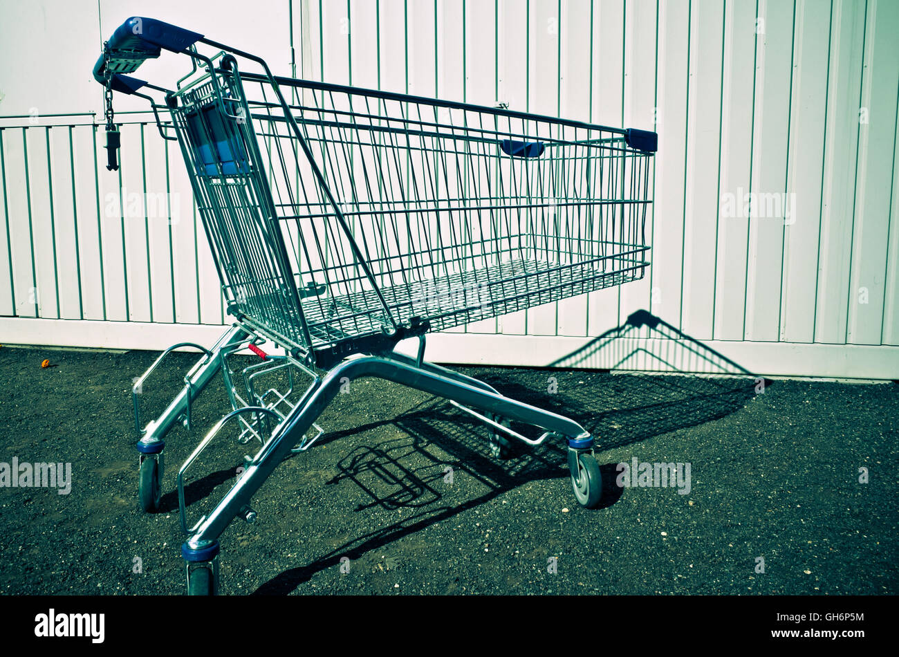 abandoned empty shopping cart Stock Photo