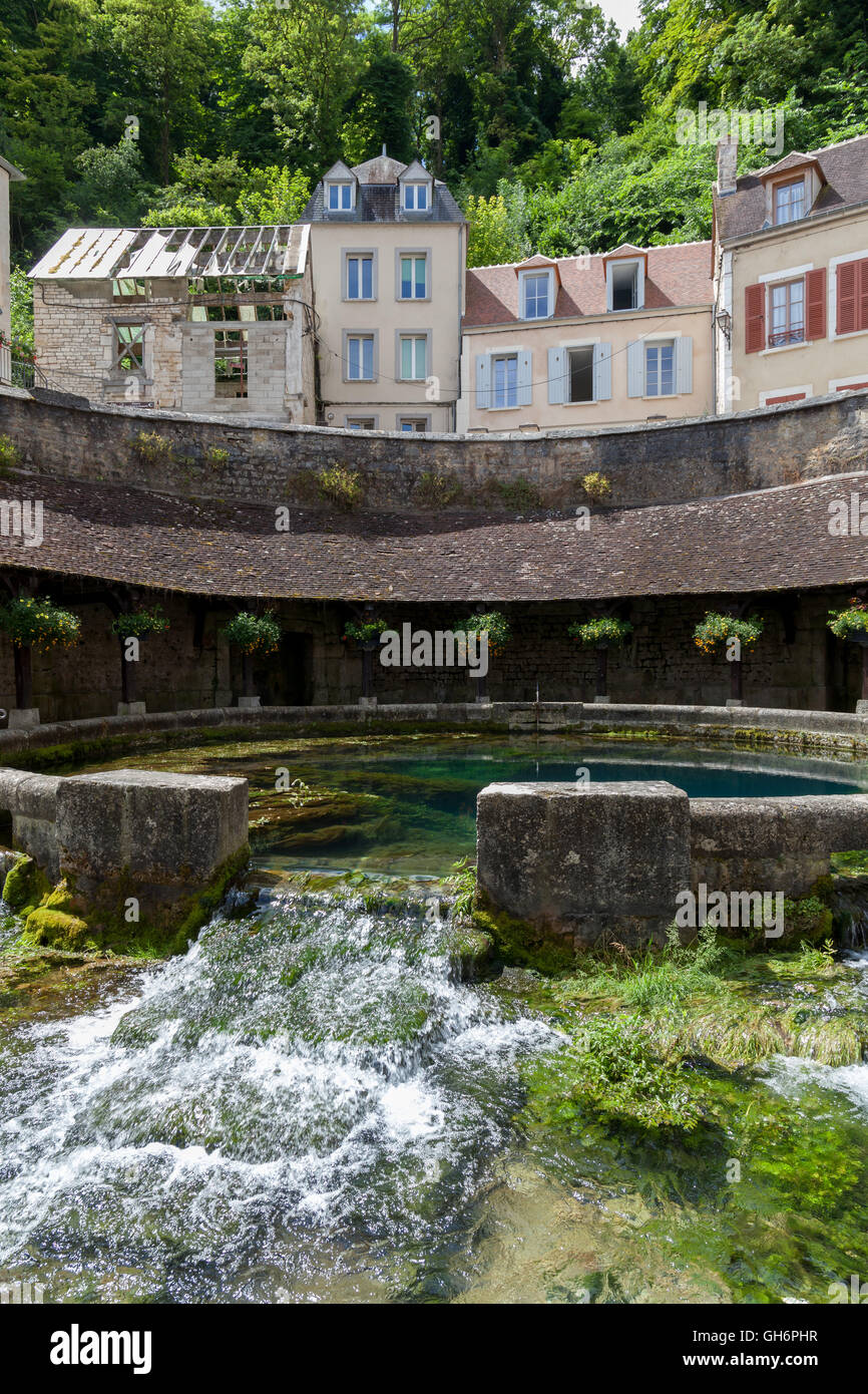 La Fosse Dionne  is a karst spring located in downtown Tonnerre. France. Stock Photo