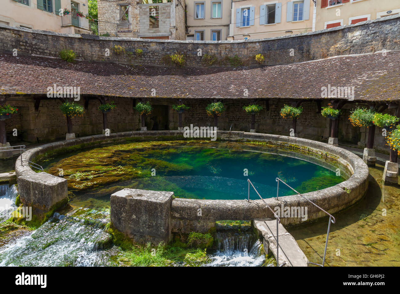 La Fosse Dionne  is a karst spring located in downtown Tonnerre. France. Stock Photo