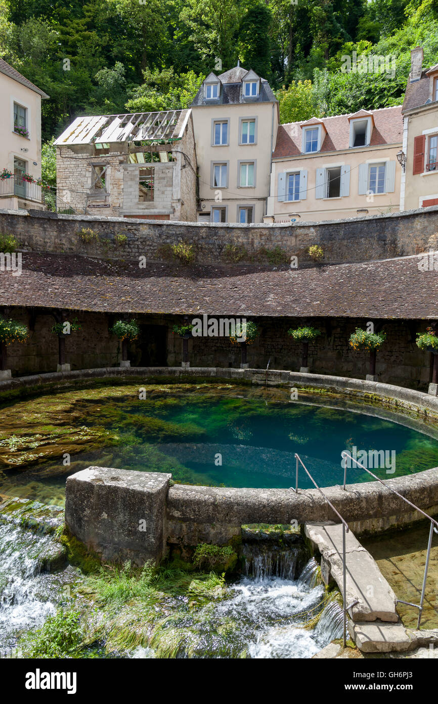 La Fosse Dionne  is a karst spring located in downtown Tonnerre. France. Stock Photo