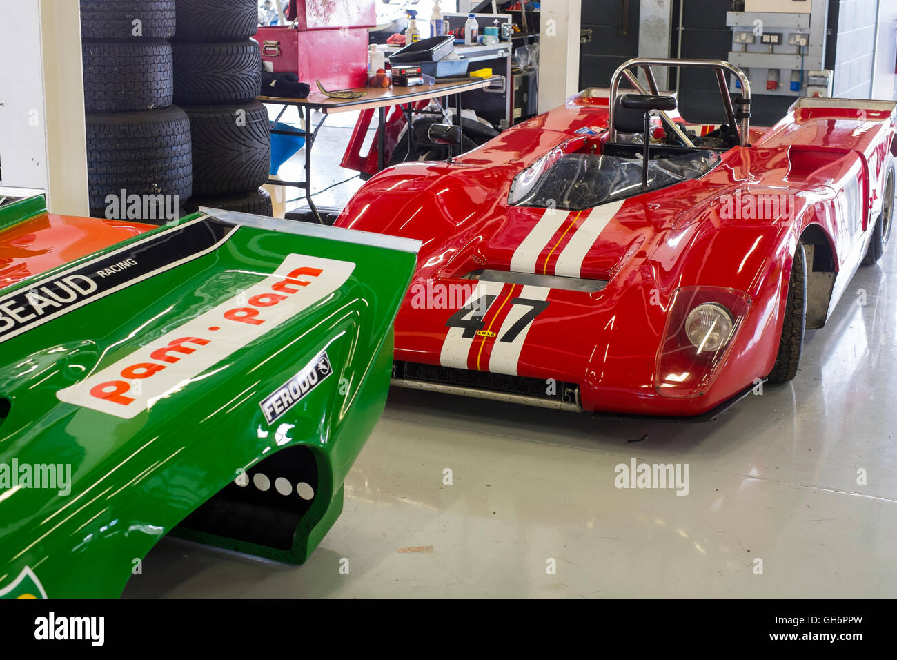 A Lola T10 sports car in the pits at 2016 Silverstone Classic event, England, UK Stock Photo