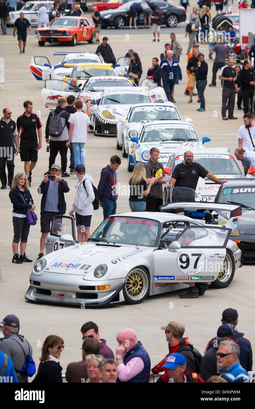 A Porsche sports car at the front of the queue  in the paddock at the 2016 Silverstone Classic event, UK Stock Photo
