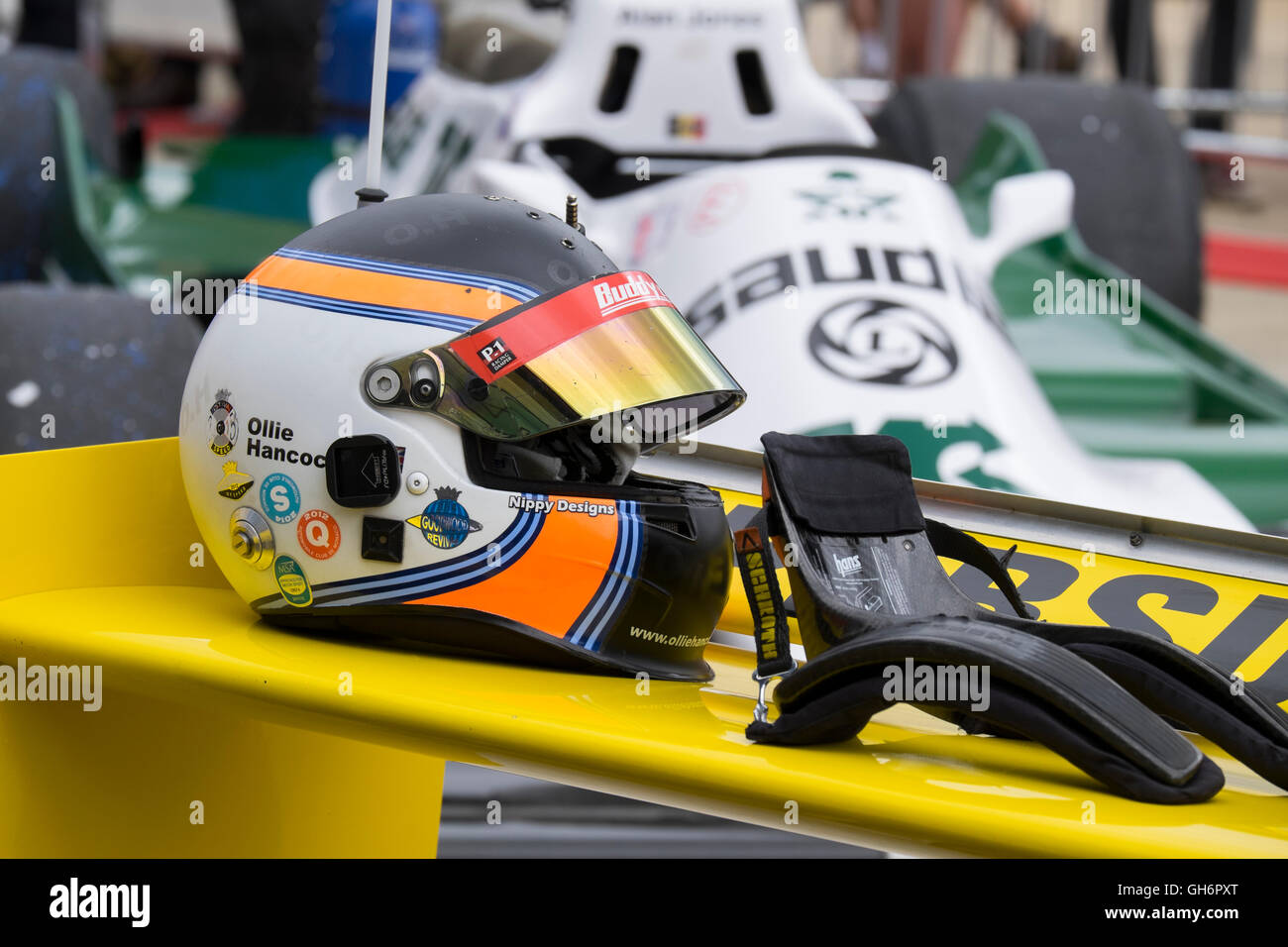Ollie Hancock's helmet on his Fittipaldi F5A, FIA Masters Historic Formula 1 race, 2016 Silverstone Classic event, UK Stock Photo