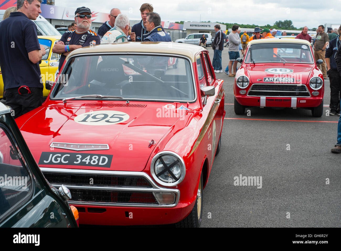 Ford Lotus Cortinas in the paddock ready to race at the 2016 Silverstone Classic event Stock Photo