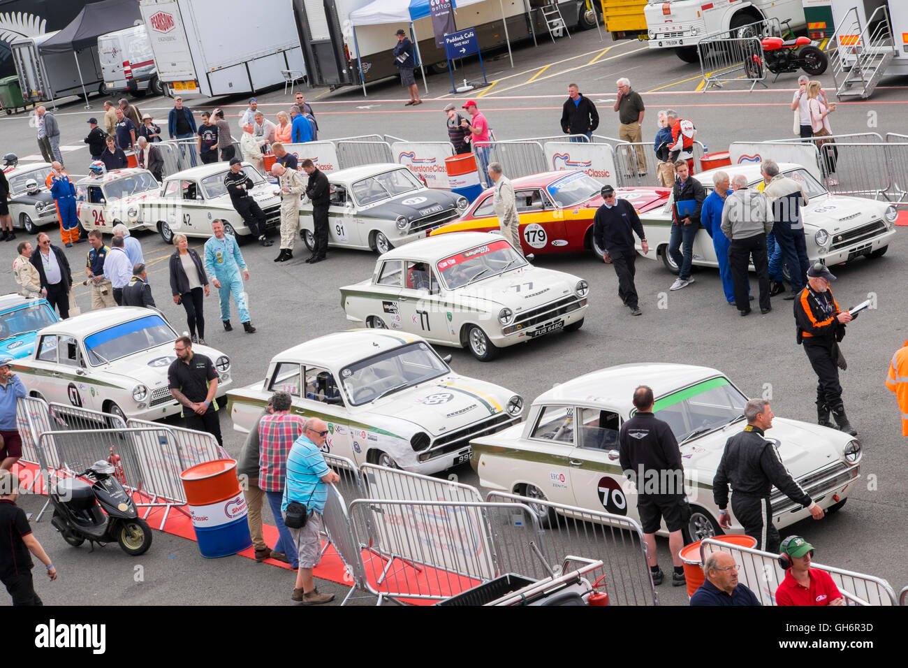 Ford Lotus Cortina saloon cars lined up in the paddock, 2016 Silverstone Classic event, England, UK Stock Photo