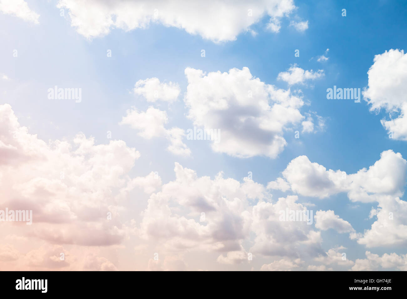 Cumulus clouds in bright sky, natural background photo Stock Photo