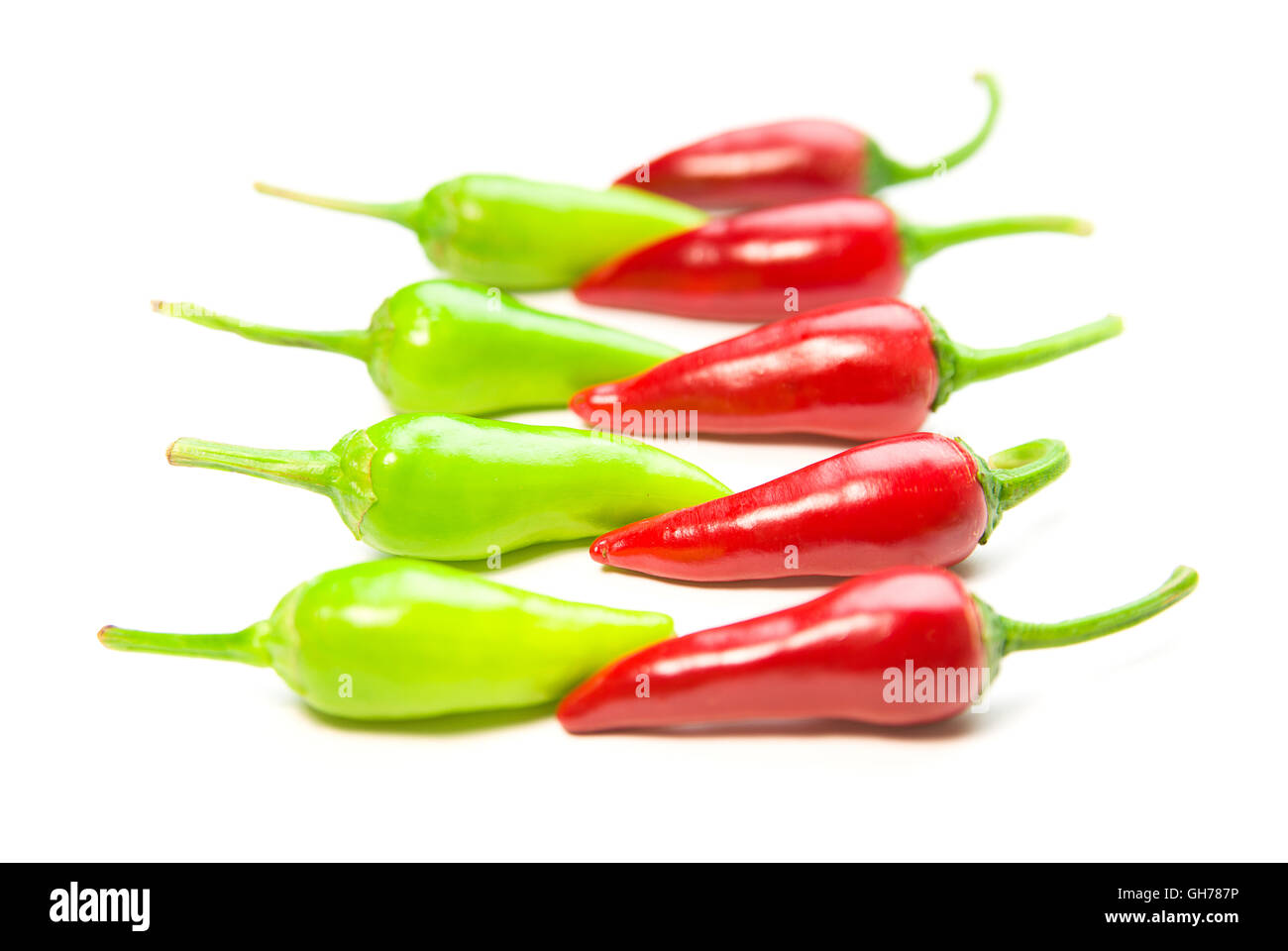 Many ripe red and green Chilli peppers on over white Stock Photo - Alamy