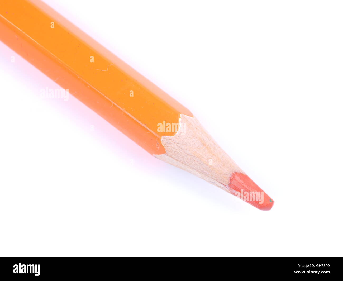 Orange pencil on a white background Stock Photo - Alamy