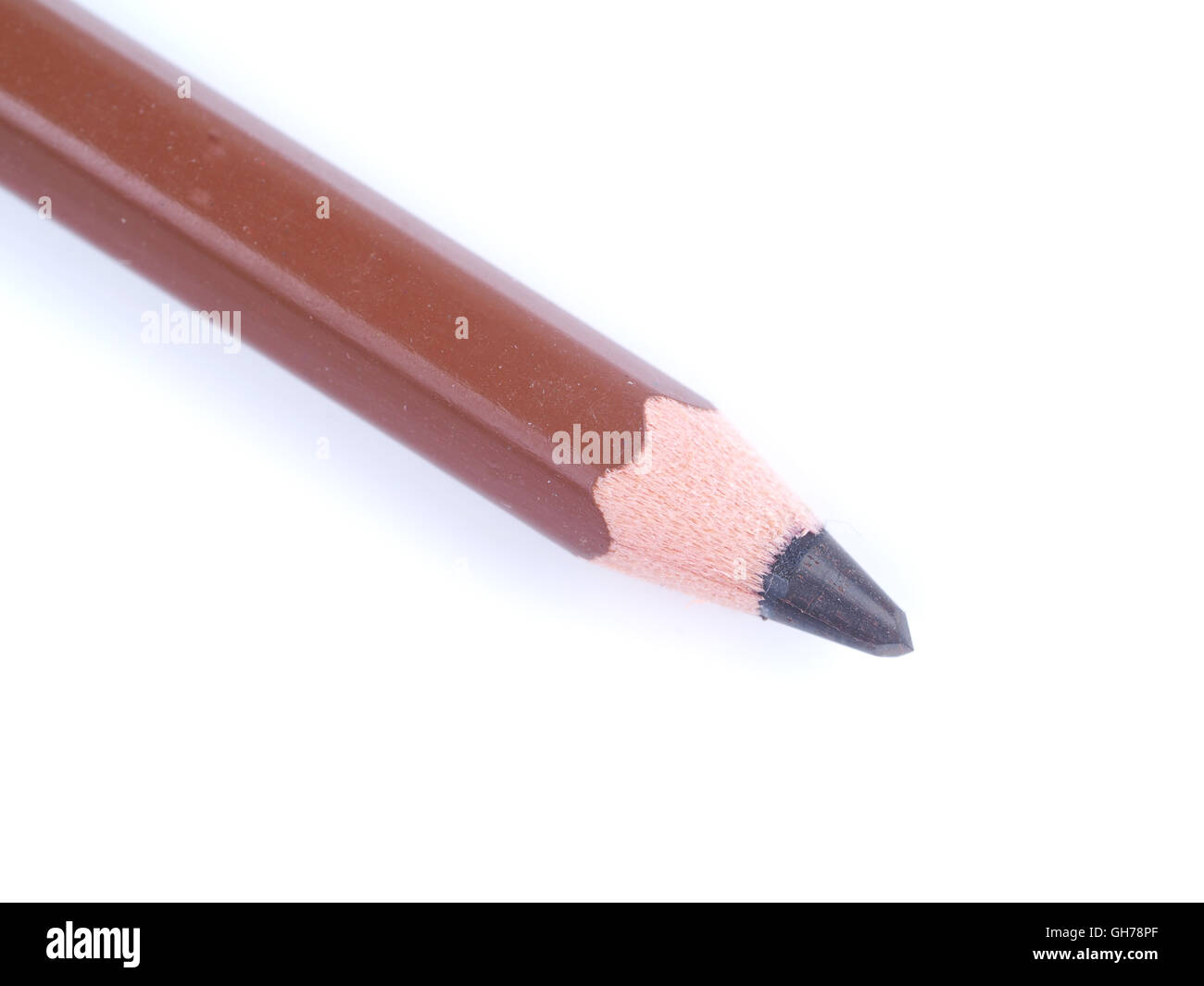 brown pencil on a white background Stock Photo - Alamy