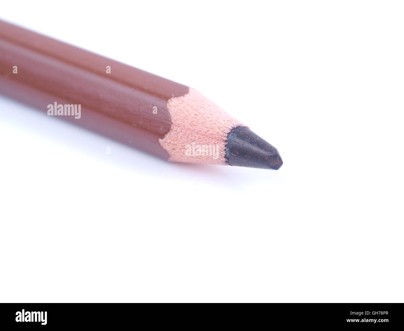brown pencil on a white background Stock Photo - Alamy