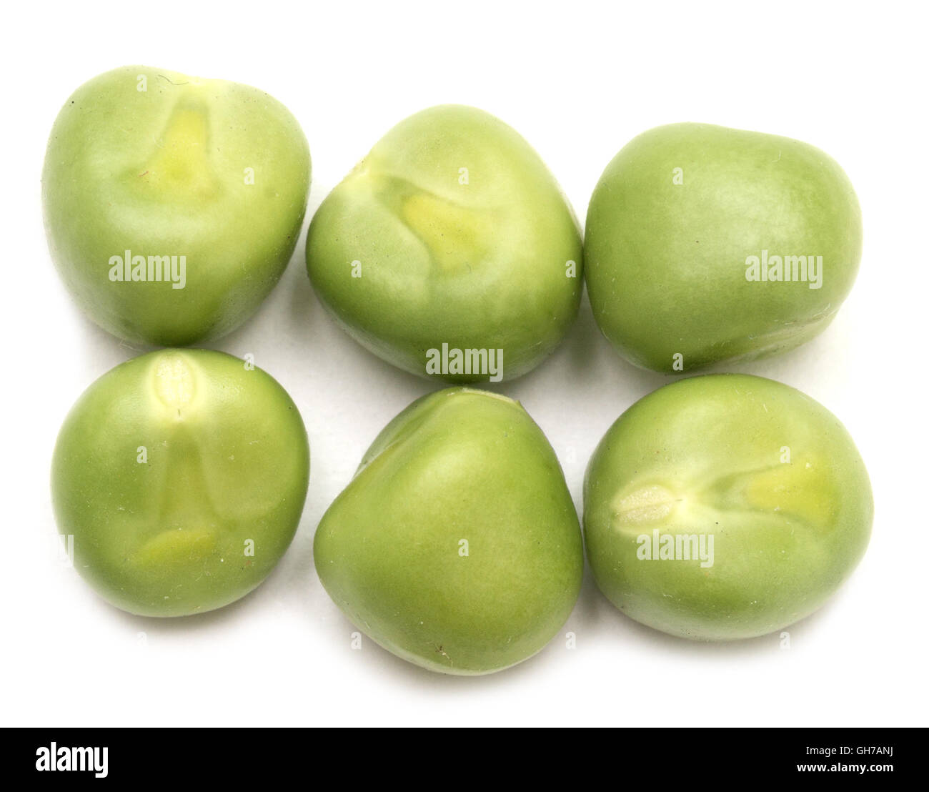 green peas isolated on white background Stock Photo - Alamy