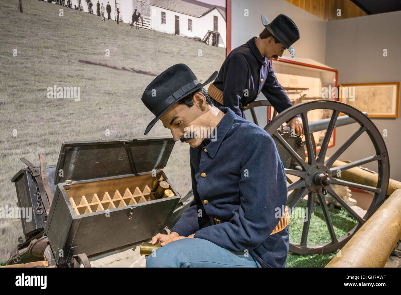 Soldiers with Hotchkiss light mountain gun, diorama at museum in 1880s Barracks, Fort Bridger State Historic Site, Wyoming, USA Stock Photo