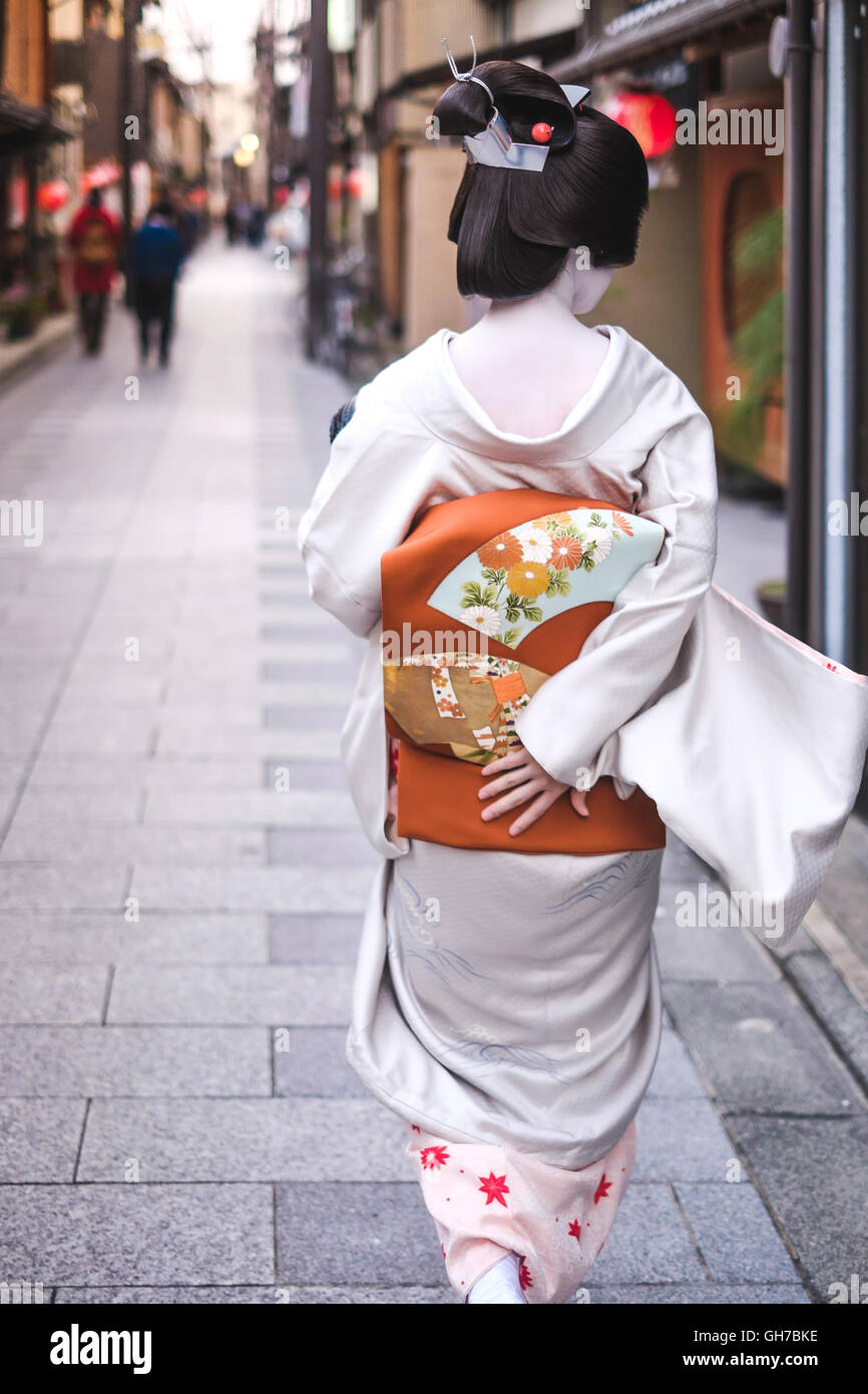 The beauty of a Geisha in the streeets of Kyoto, Japan Stock Photo