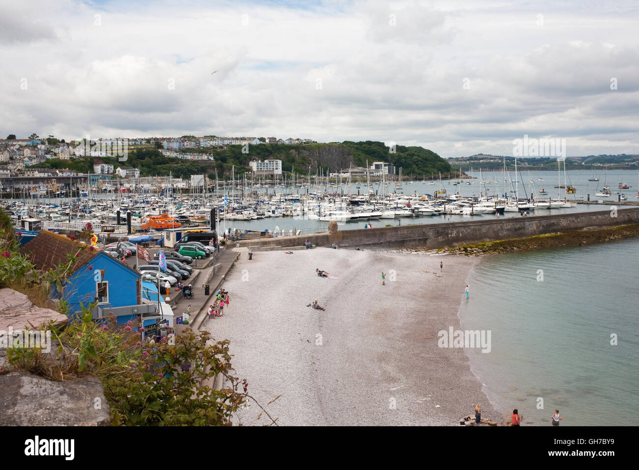 the harbour wall and marina in brixham devon Stock Photo
