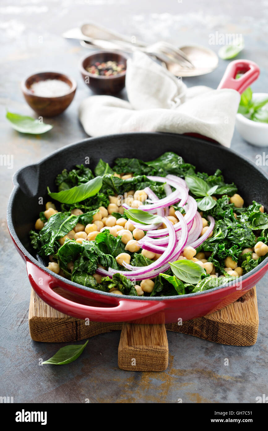 Sauteed kale with chickpeas and red onion Stock Photo Alamy