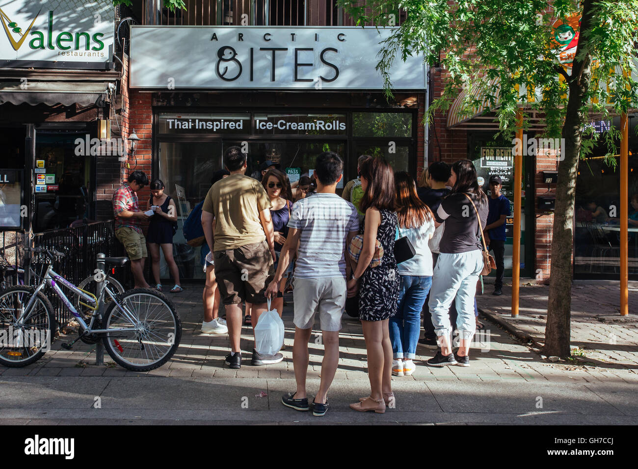 People lineup for Thai icecream arctic bites in a hot Toronto summer day Stock Photo