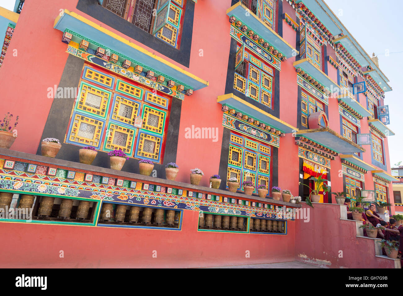 Colourful architectural detail of the windows of the Shechen monastery near Boudhanath, Kathmandu, Nepal Stock Photo