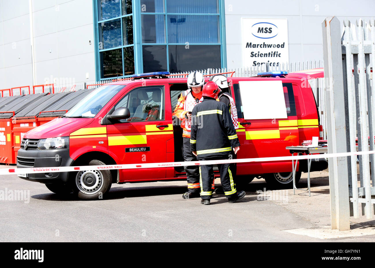 Marchwood, Hamphire, UK. 8th August 2016. Emergency crews from Hampshire fire and rescue service and South central  ambulance  service remain at the  cene of a  fire that broke out just after lunchtime today.  Fire crews have been brought from a far a field as Portsmouth to tackle the blaze at the fire at the recycling centre in East Road  Marchwood.  Eight fire engines two aerial ladders  and the incident command unit from Eastleigh been brought in to put out the fire out. Credit:  uknip/Alamy Live News Stock Photo