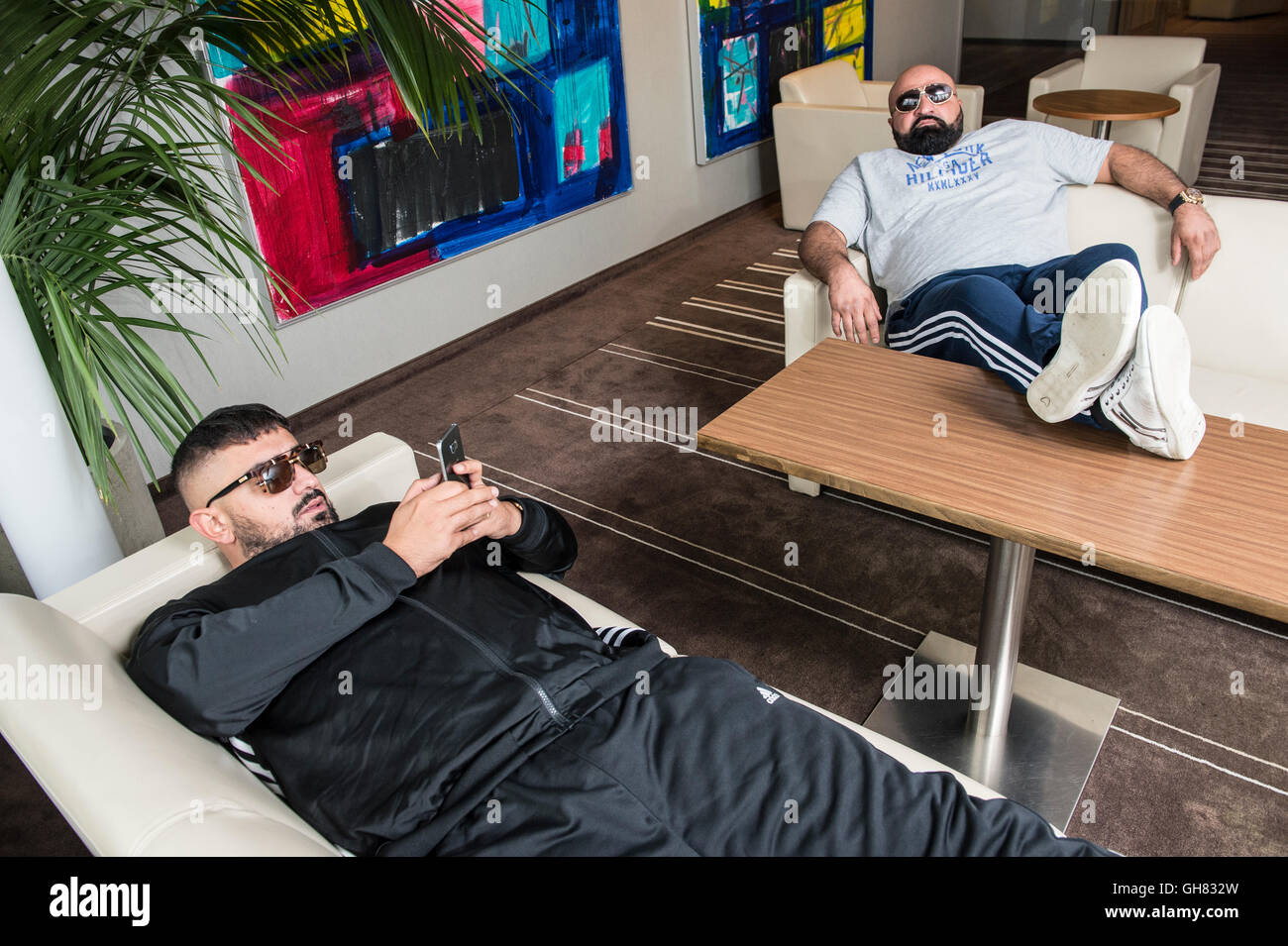 Berlin, Germany. 14th July, 2017. Rappers Xatar (R) and Aykut Anhan, alias  Haftbefehl, pose for the camera before an interview in Berlin, Germany, 14  July 2017. The two rappers perform under the