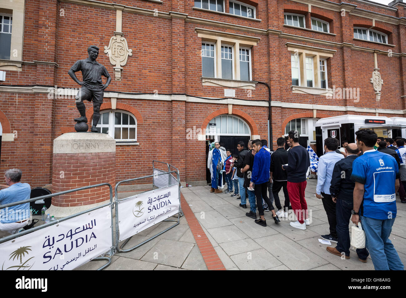 London, UK. 8th August, 2016. Saudis and other middle-eastern fans enter the stadium. Al-Ahli vs Al-Hilal Saudi Super Cup match finals at Craven Cottage, Fulham Football Club Credit:  Guy Corbishley/Alamy Live News Stock Photo