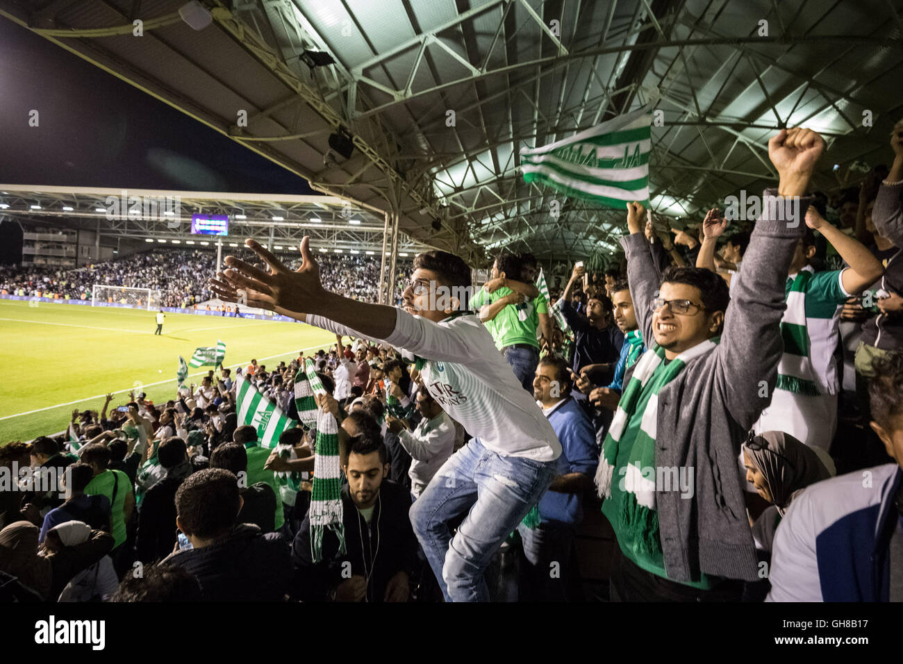 London, UK. 8th August, 2016. Saudis and other middle-eastern fans watch teams  Al-Ahli vs Al-Hilal during the Saudi Super Cup match finals at Craven  Cottage, Fulham Football Club Credit: Guy Corbishley/Alamy Live