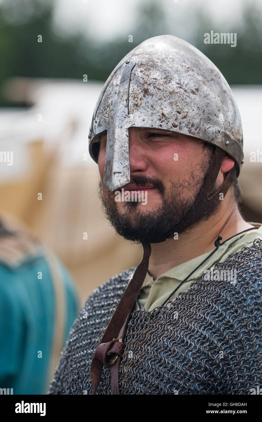 Viking male wearing helmet and chainmail armour Stock Photo