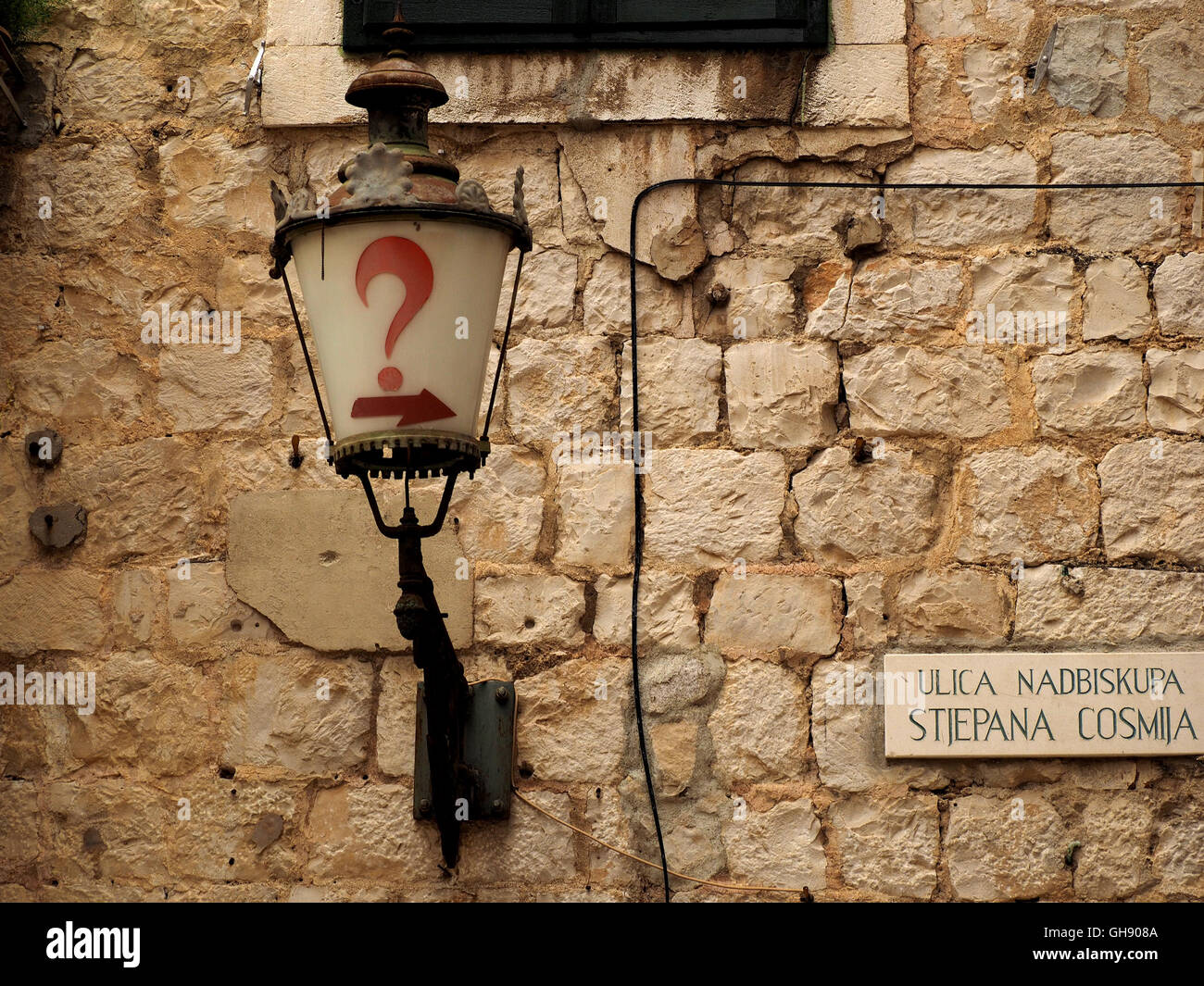 street light with red question-mark and arrow in Narodni Trg Square aka Pjaca Split Croatia Stock Photo