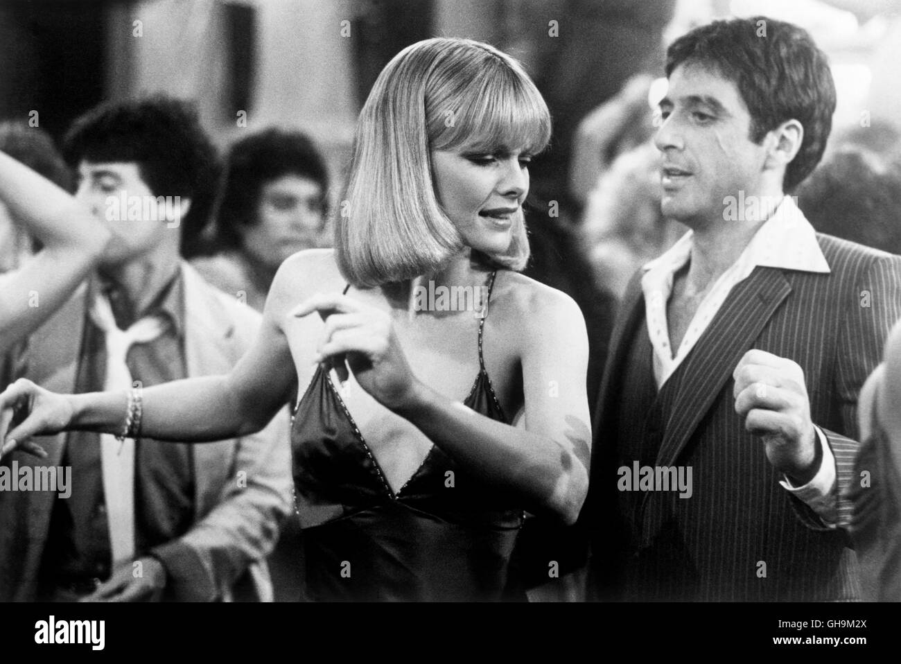 MICHELLE PFEIFFER (Elvira Montana) und AL PACINO (Scarface/Tony Montana) Regie: Brian de Palma Stock Photo