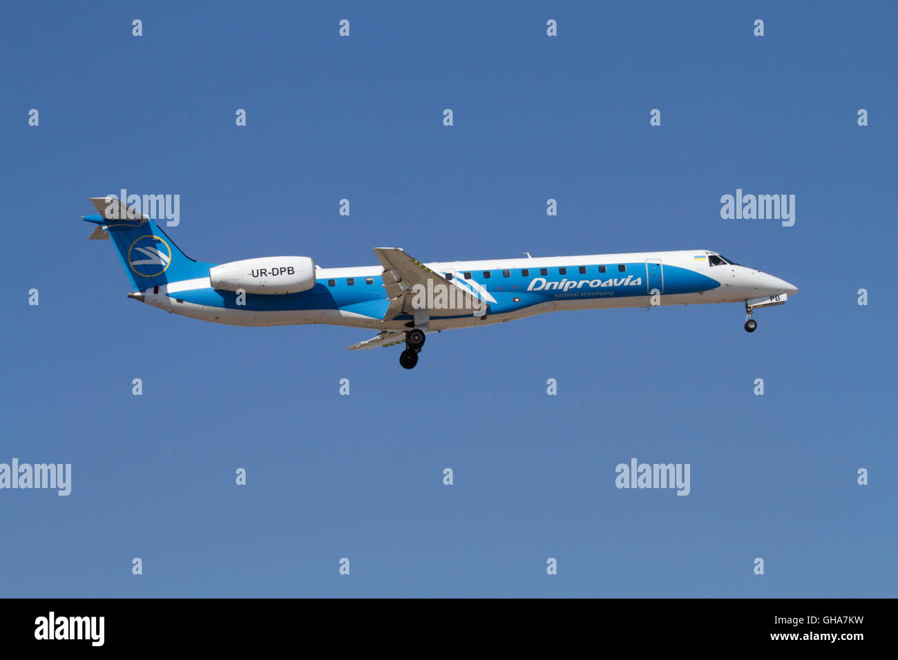 Commercial air travel. Dniproavia Embraer ERJ 145 regional airliner on approach Stock Photo