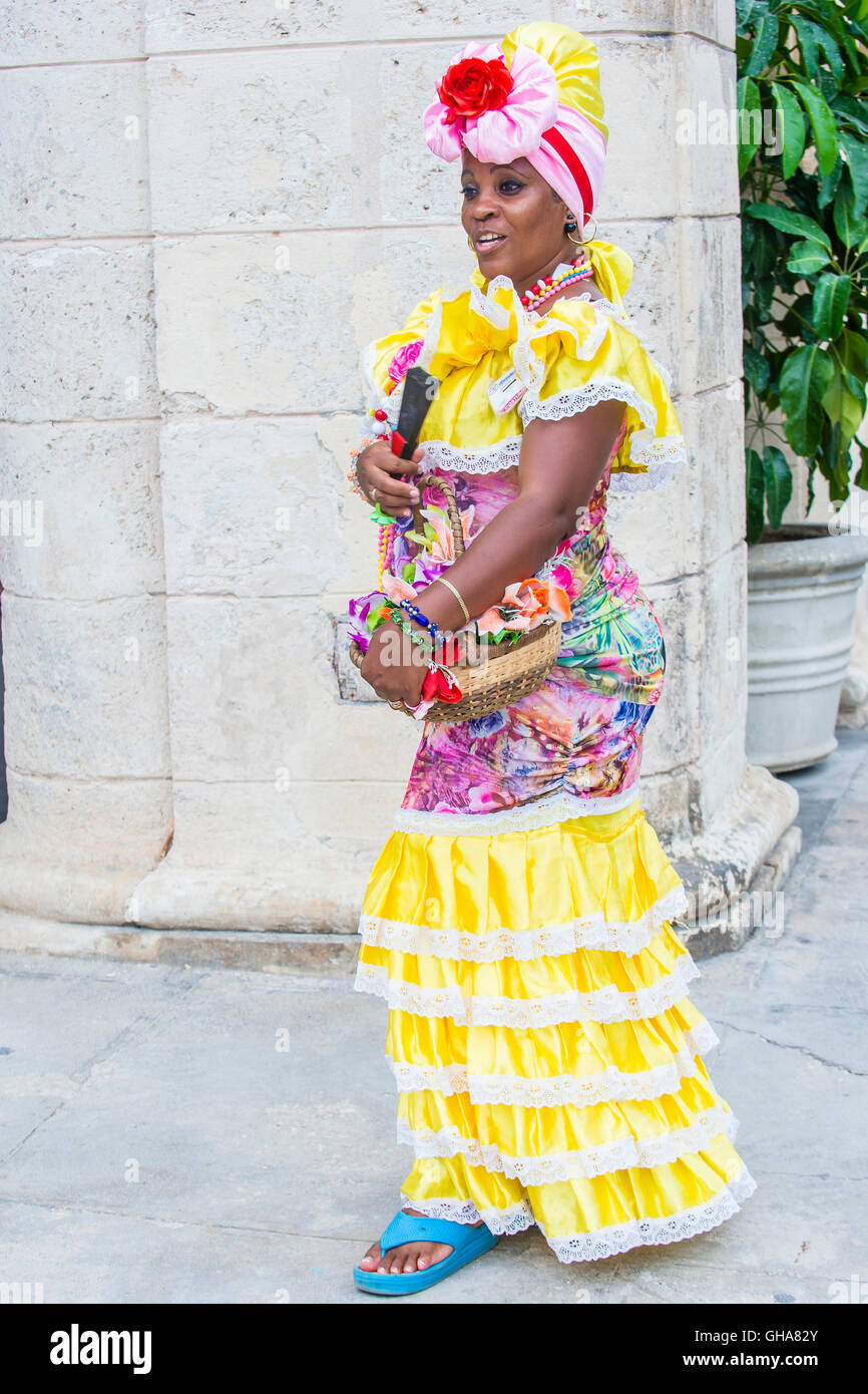 Cuban woman with traditional clothing in old Havana Stock Photo - Alamy