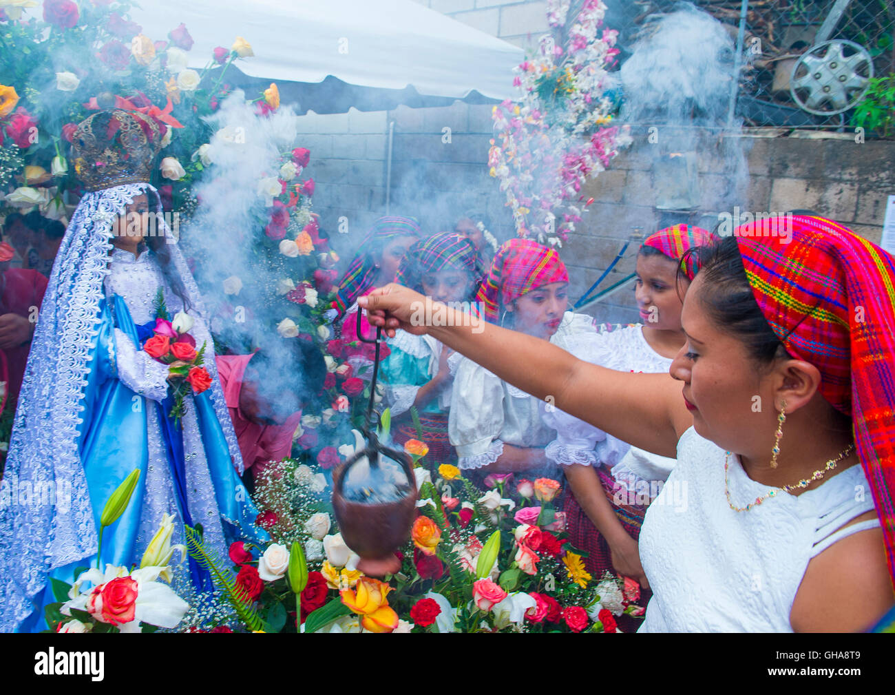 Salvadorian women participate in the procession of the Flower & Palm Festival in Panchimalco, El Salvador Stock Photo