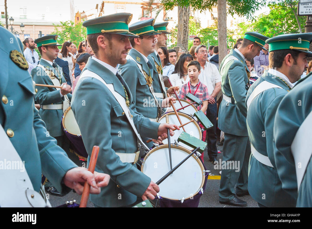 Marching band Europe, a marching band plays ahead of a religious procession during Easter Holy Week in Seville, Spain. Stock Photo