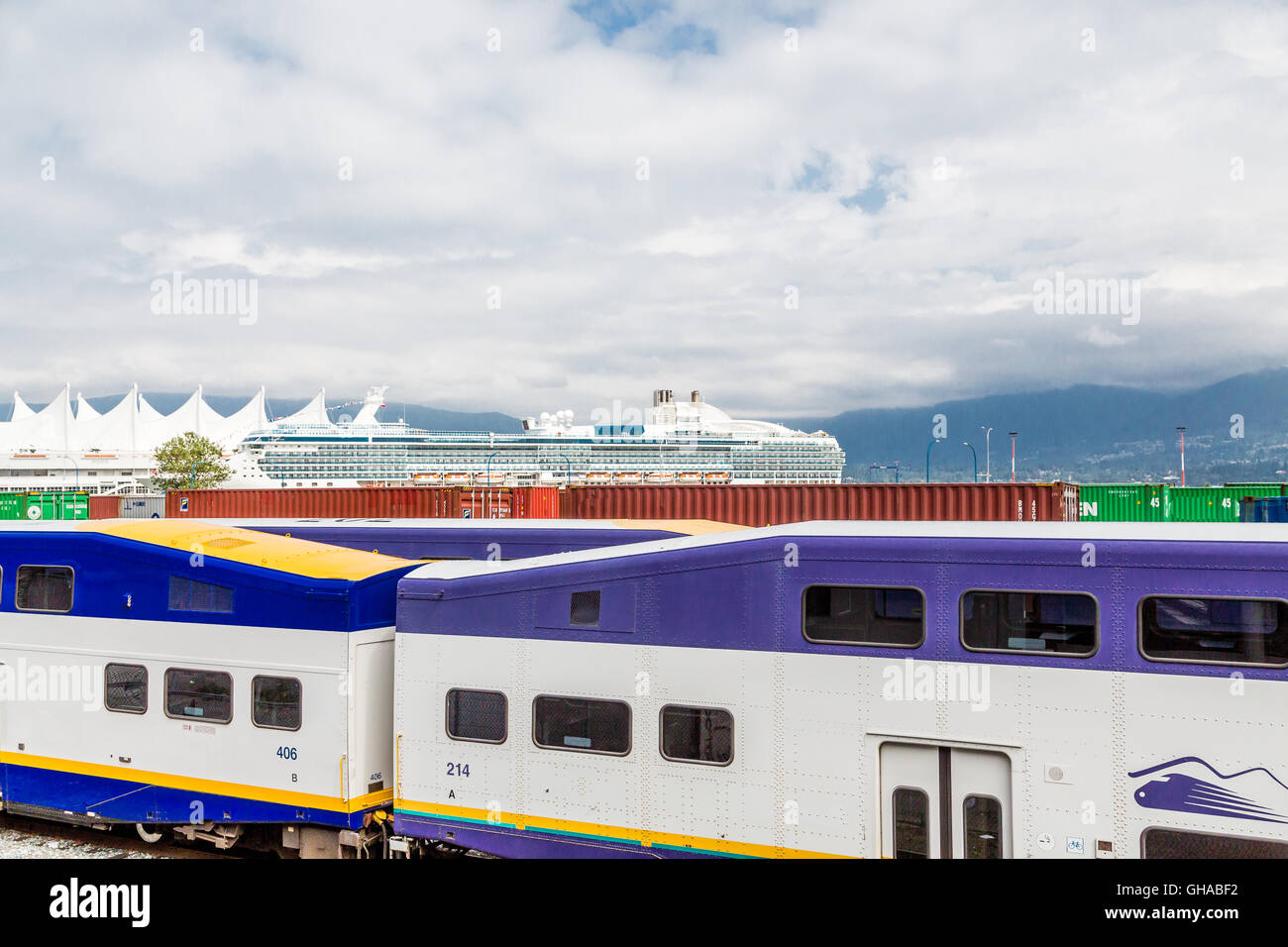Passenger and Freight Train by Cruise Ship in Vancouver Stock Photo Alamy