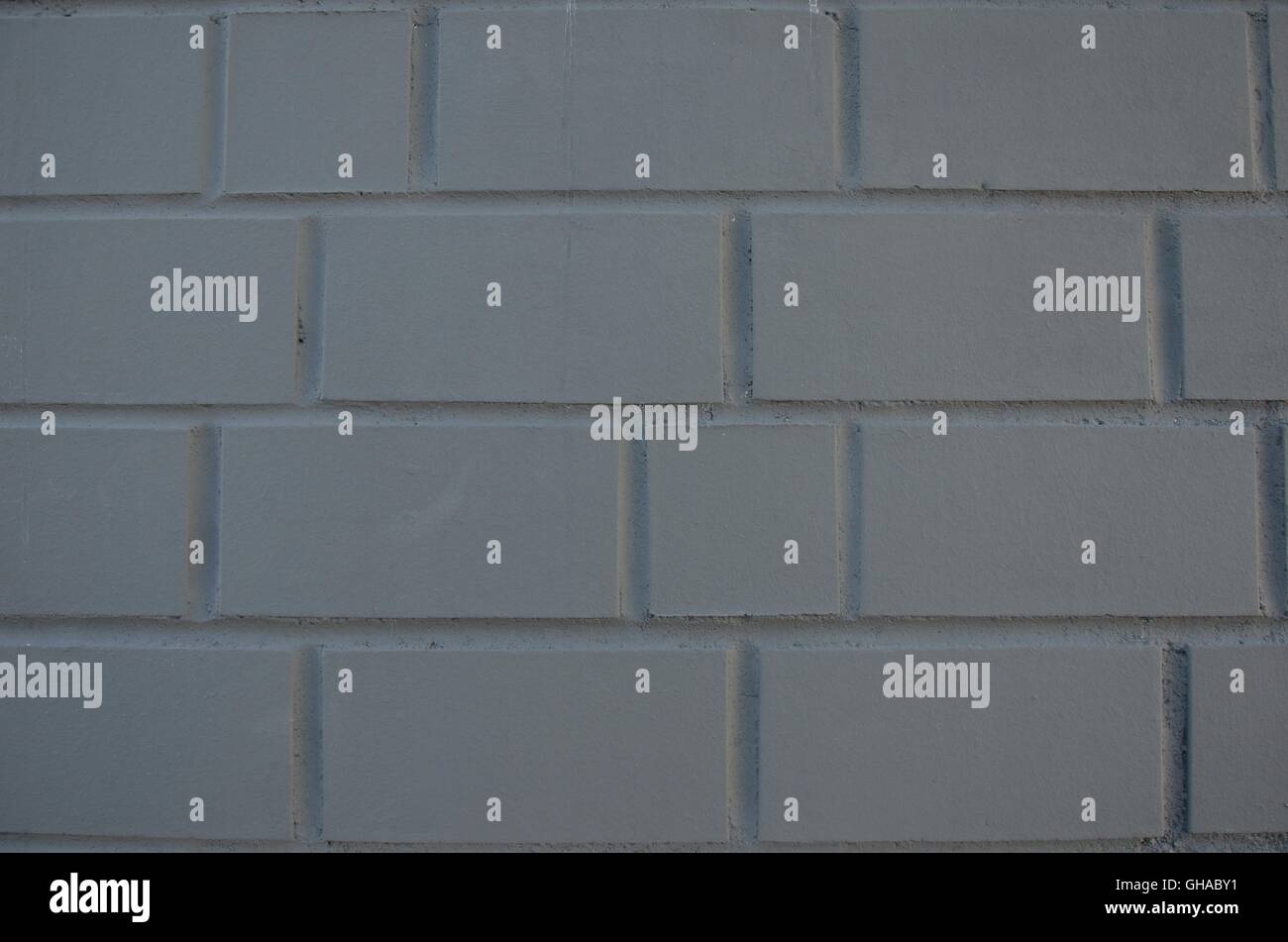 regular gray brick wall background Stock Photo - Alamy